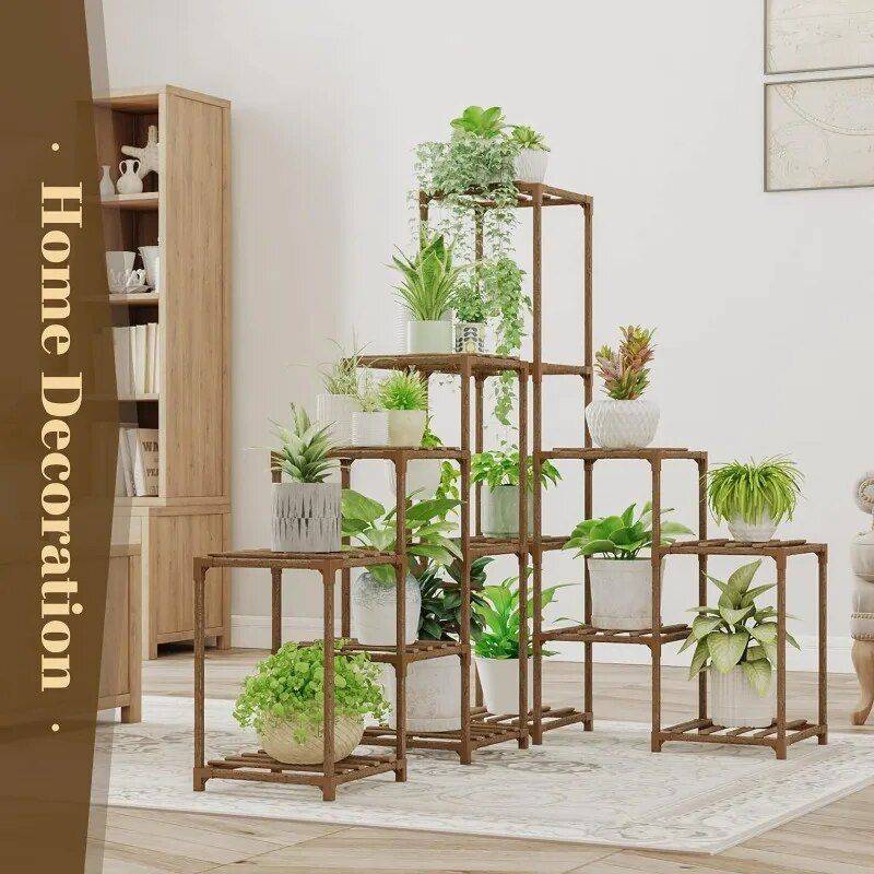 Multi-tier wooden plant stand with plants in white pots